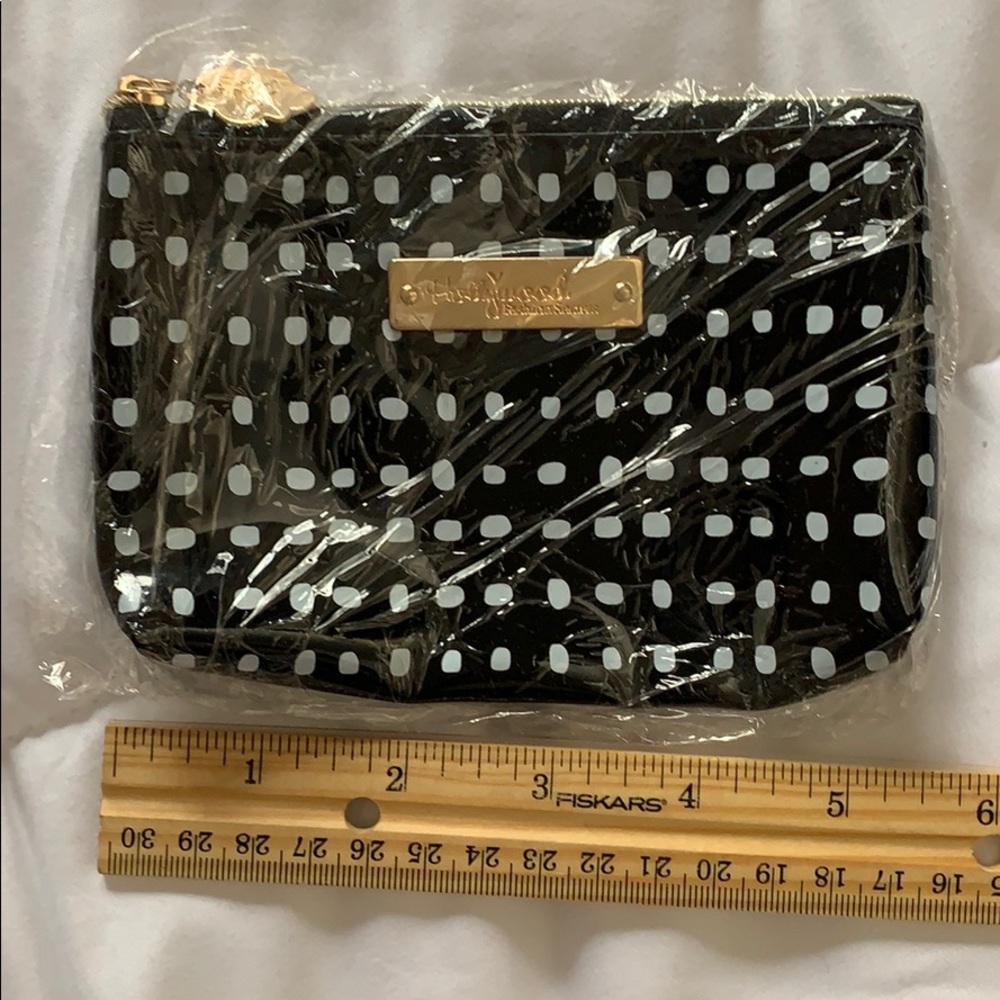 Black and white cosmetic bag, new in wrapping